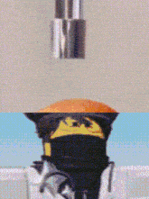 a close up of a person 's hand reaching for a donut next to a picture of a ninja
