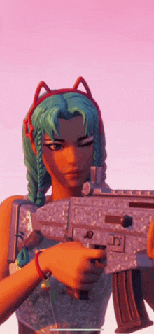 a girl with green hair is holding a gun in her hand .