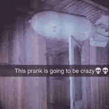 a snapchat of a room with a balloon hanging from the ceiling and a skull on the wall .