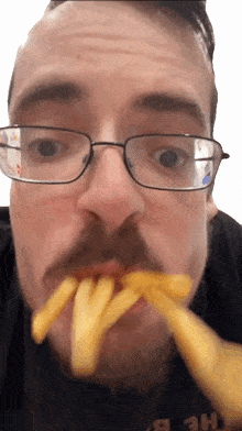 eating ricky berwick therickyberwick snacking having a mouthful of fries