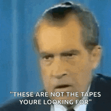 a close up of a man 's face with the words " these are not the tapes you 're looking for "