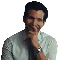 a man with a watch on his wrist is smiling and covering his mouth with his hand