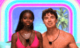a man and a woman standing next to each other in front of a rainbow