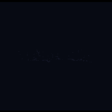 a blurry picture of a city at night with a red line