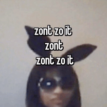 a woman wearing bunny ears and sunglasses says zont zo it zont zo it zont zo it