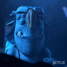 a blue cartoon character from netflix is shown in a close up