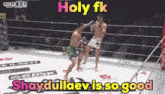 two men are fighting in a boxing ring with the words holy fk shaydullaev is so good