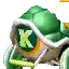 a green turtle with the letter k on it is sitting on a white background .