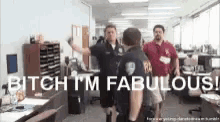 a group of police officers are standing in a room with a sign that says bitch i 'm fabulous !
