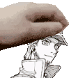 a hand is holding a drawing of a man 's head in a hat .
