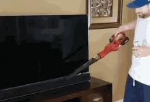 House Cleaning Remove Dust GIF - House Cleaning Remove Dust Dust Blower GIFs