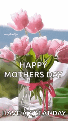 a vase filled with pink flowers and the words `` happy mothers day have a great day ''