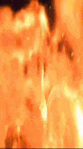 a blurred image of a fire at night