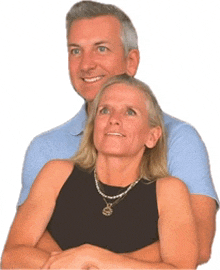 a man and a woman are posing for a picture