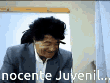 a man in a suit says inocente juvenil
