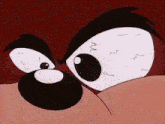 a close up of a cartoon character 's eyes with the letter m on them