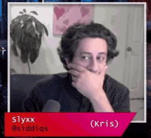 a picture of a man covering his mouth with his hand with the name slyxx on the bottom