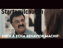 a man with glasses is talking to a woman and says such a echa behavior machii