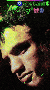 a close up of a man 's face with the words saint c on the top