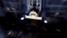 a star wars episode 1 sign is displayed in a dark room .