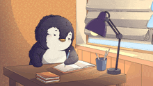 a penguin is sitting at a desk writing in a book