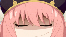 a close up of a girl 's face with pink hair