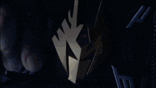 a drawing of a dragon 's head is lit up in the dark