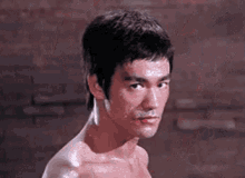 李小龍 GIF - Bruce Lee Chuck Norris Stare GIFs