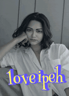 a black and white photo of a woman with the words " love ipeh " on the bottom