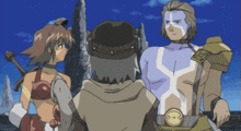 a man with a blue x on his chest is standing next to a woman and a man