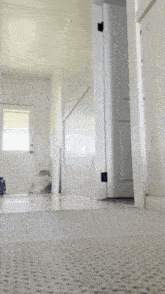 a person is bending over in a hallway