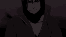 a man in a black jacket is crying with tears running down his face .