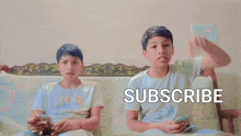 two young boys sitting on a couch with the word subscribe on the bottom