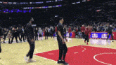 a basketball court with a red bull advertisement on the side