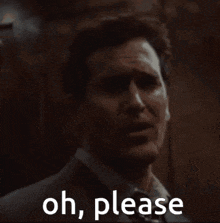 a man in a suit and tie is making a face and says oh please