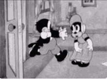 a black and white cartoon of a monkey and a girl standing next to each other .