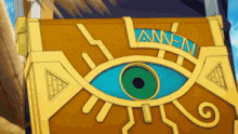 a gold box with a green eye and the word amen written on it