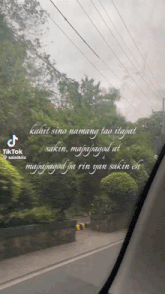 a picture of a car windshield with a quote from tiktok on it