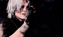 a man with white hair is holding a gun