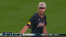 a braves pitcher throws a pitch during a game