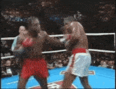 Riddick Bowe Boxing GIF - Riddick Bowe Boxing Evander Holyfield GIFs