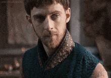 a close up of a man 's face with the words lord aldhelm gifs on the bottom
