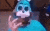 a blurry picture of a person wearing a blue and white bunny mask .