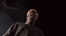a man is being kicked in the face in a video game and says `` suck on this '' .