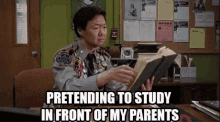 Pretending To Study In Front Of My Parents GIF