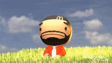 a cartoon character with a m on his head is standing in a field of grass