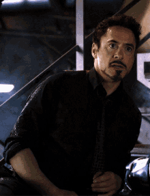 Tony Stark Looking GIF - Tony Stark Looking Avengers GIFs
