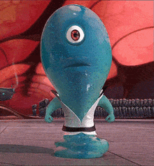 a cartoon character with one eye is standing on a surface