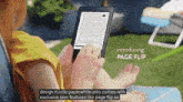 a woman is using a kindle while sitting on a lawn
