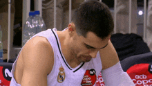 a man wearing a white jersey that says copa del rey